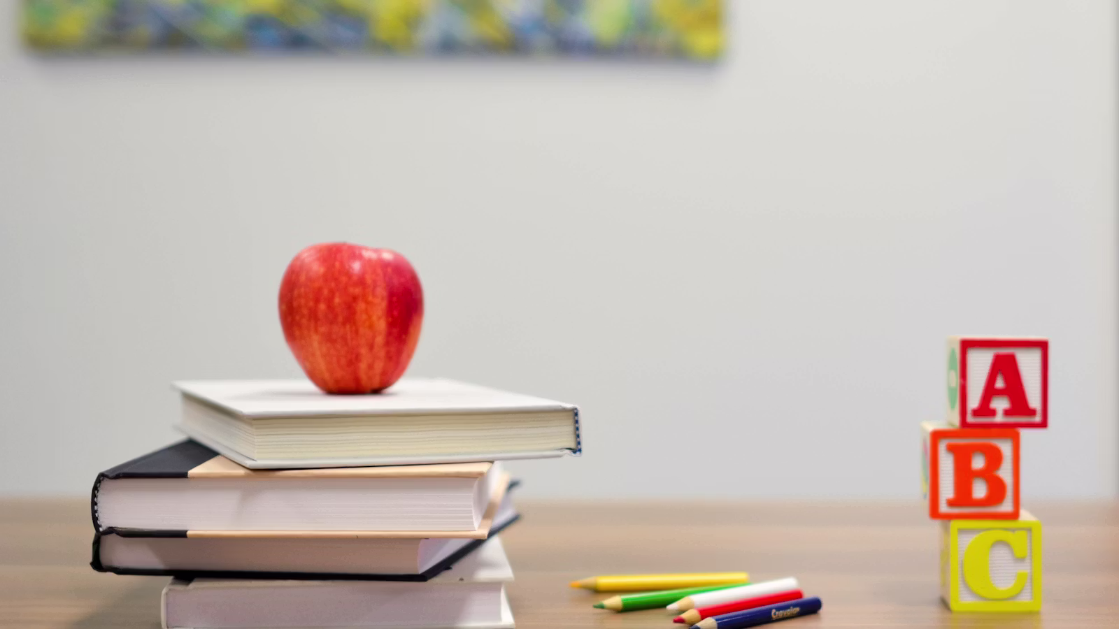 School-age child with backpack and books