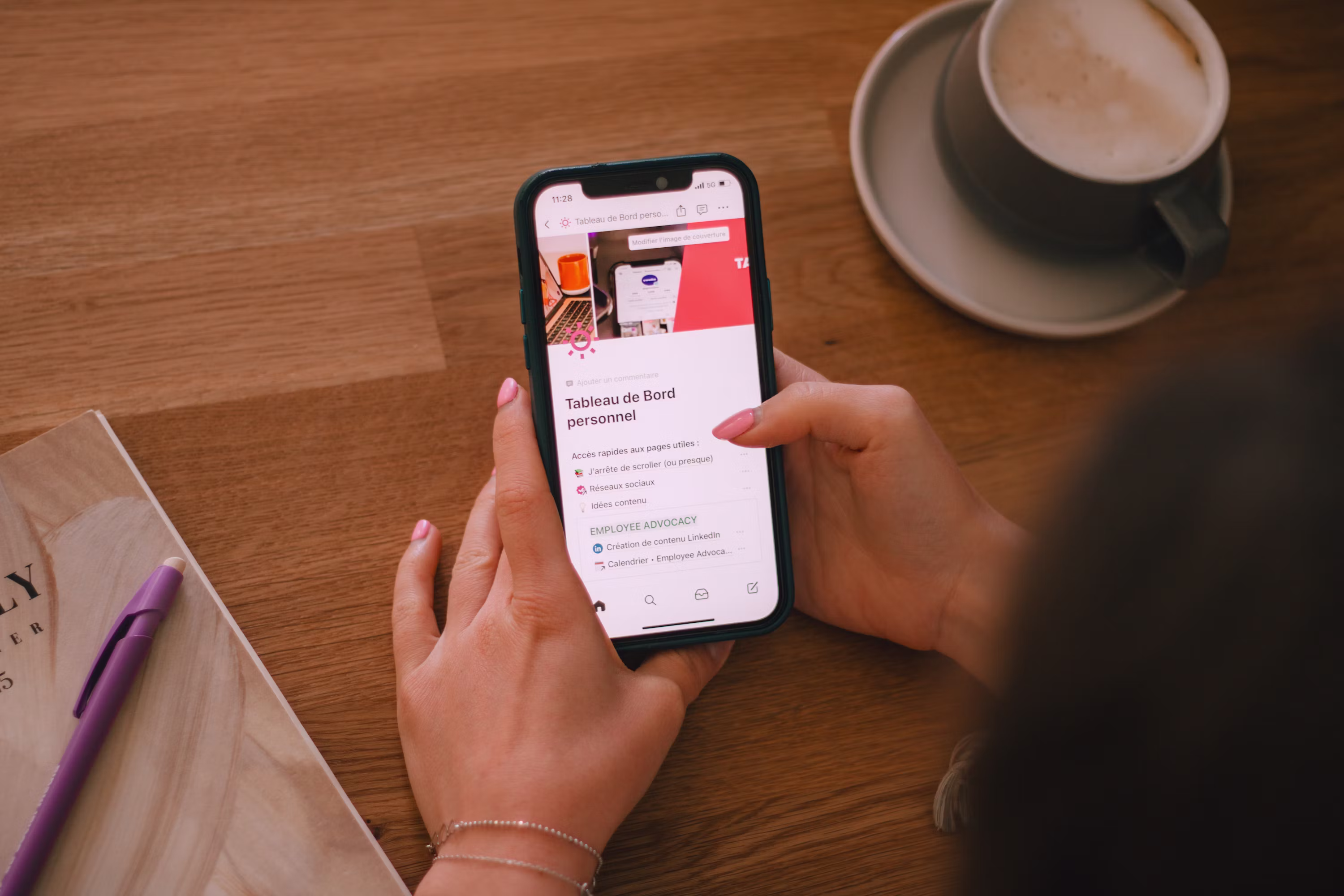 Person scrolling a social feed on a mobile phone