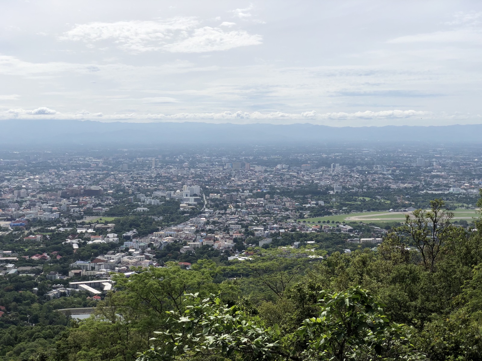 A clear daytime view over Chiang Mai from Doi Suthep