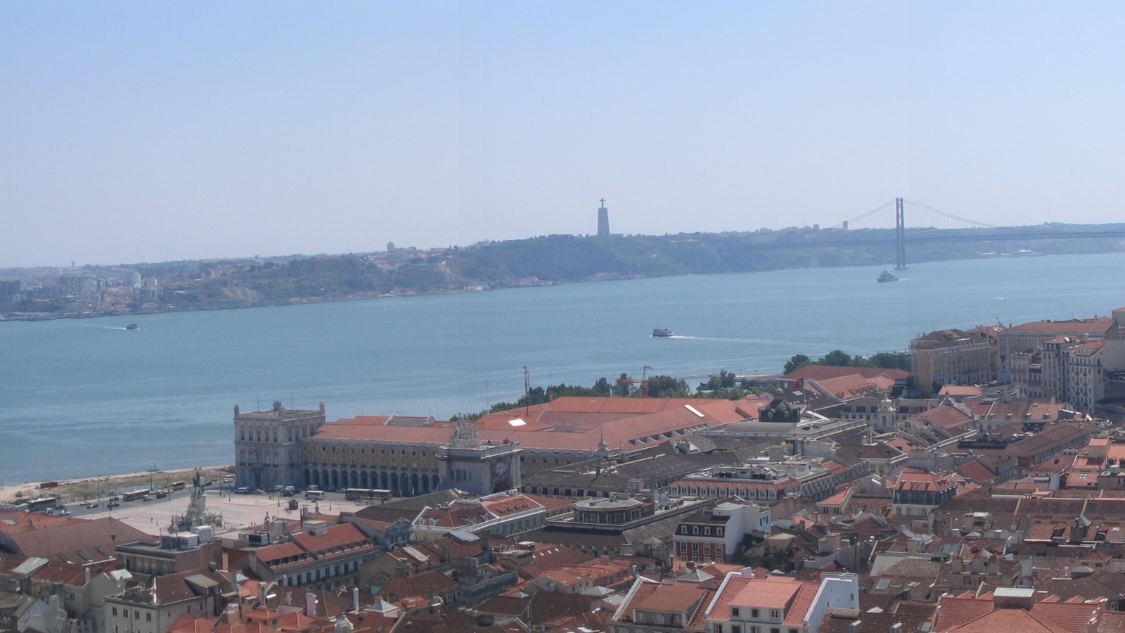 Lisbon rooftops and the Tagus viewed across the historic city