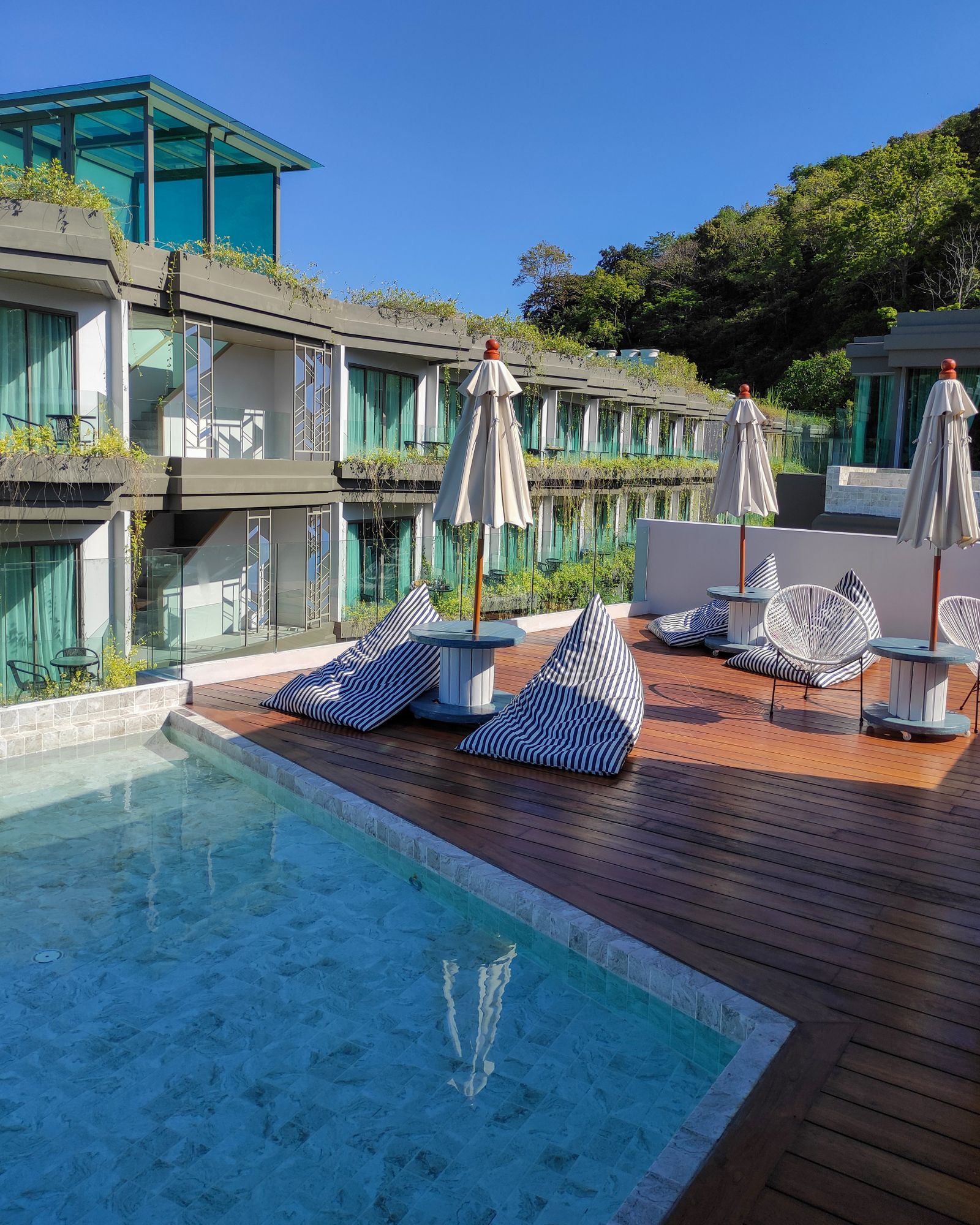 A luxury pool area at a tropical resort in Phuket