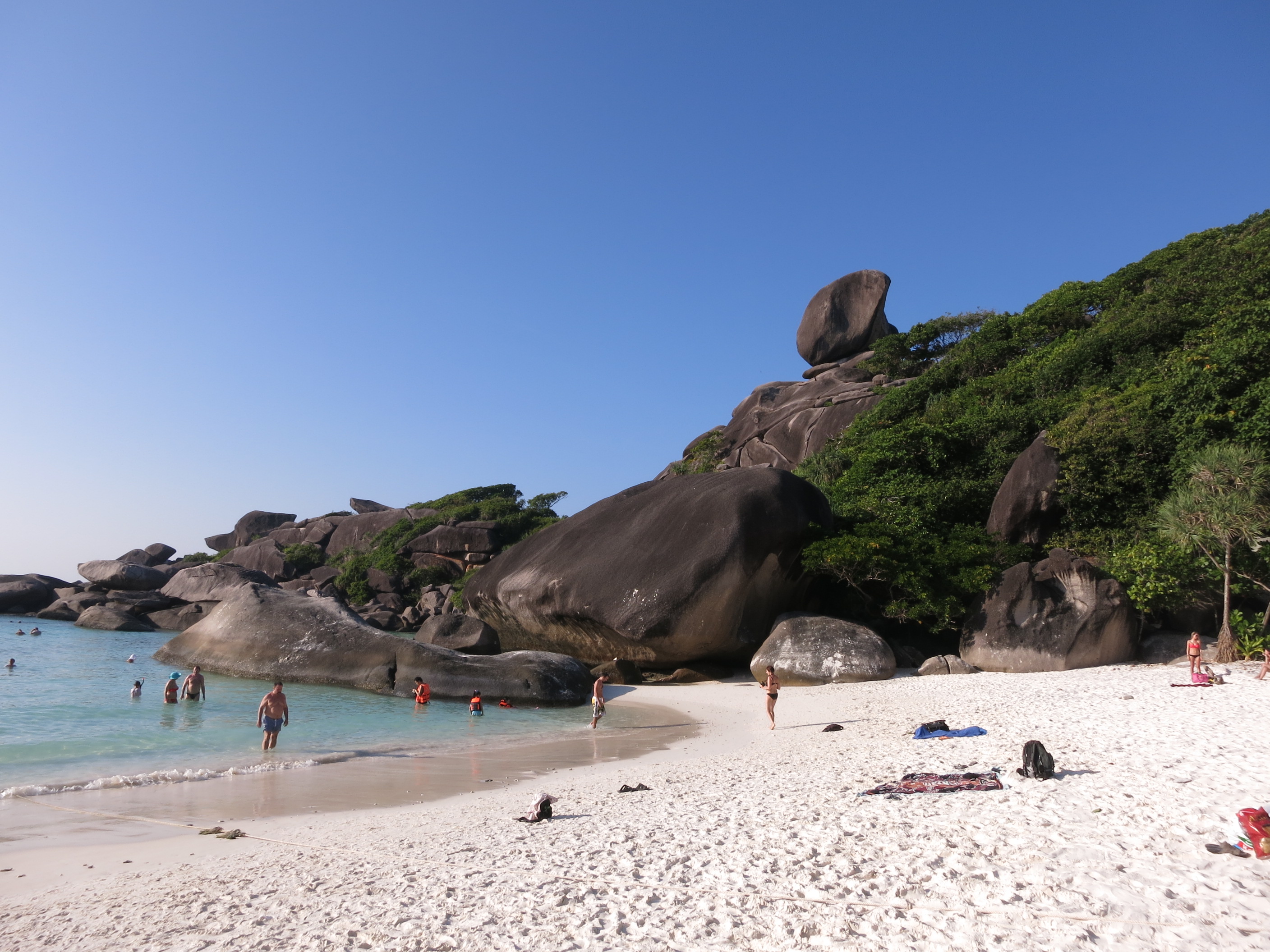 Clear turquoise water and a white-sand beach in the Similan Islands